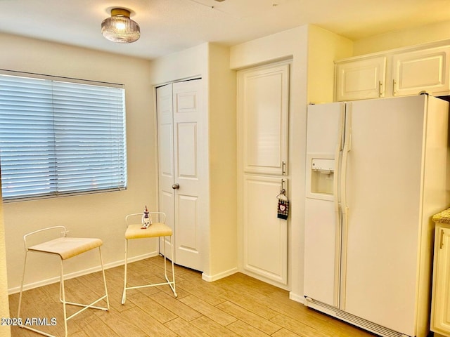 15225 N 100th St Unit 1220, Scottsdale, AZ 85260 - sitting room with baseboards and light wood-style flooring