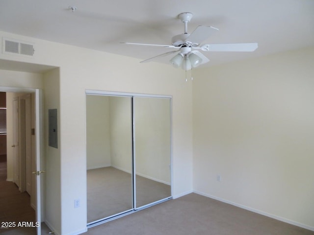 15225 N 100th St Unit 1220, Scottsdale, AZ 85260 - unfurnished bedroom with visible vents, carpet floors, a closet, baseboards, and electric panel