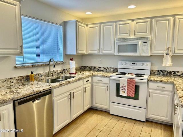 15225 N 100th St Unit 1220, Scottsdale, AZ 85260 - kitchen with a sink, white cabinets, and white appliances