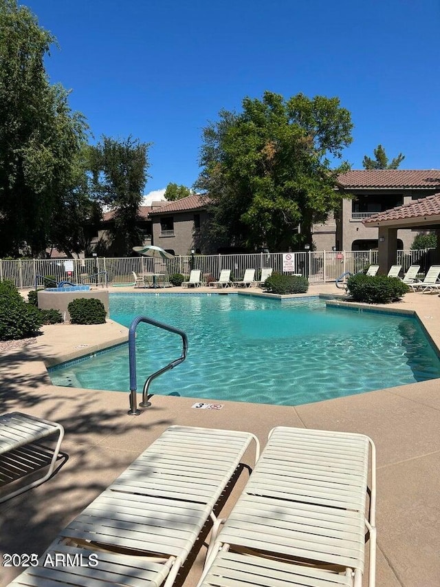 15225 N 100th St Unit 1220, Scottsdale, AZ 85260 - community pool featuring a patio and fence