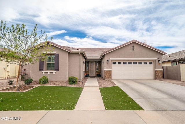 ranch-style home with a garage, a front yard, a tiled roof, and stucco siding