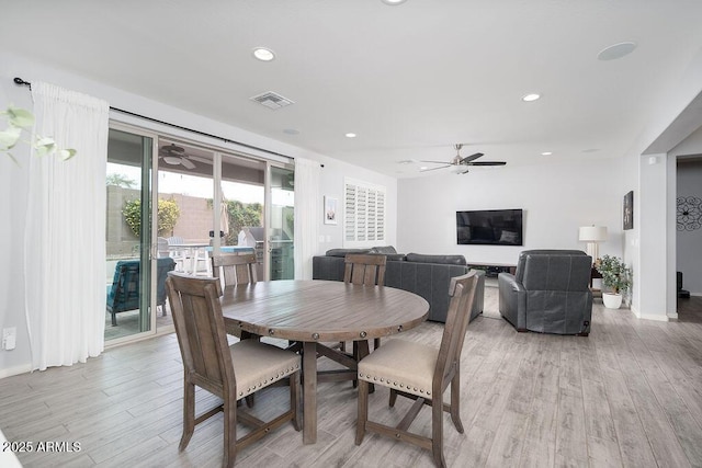 dining area with a ceiling fan, recessed lighting, visible vents, and light wood finished floors