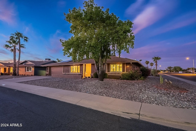 ranch-style home with a garage