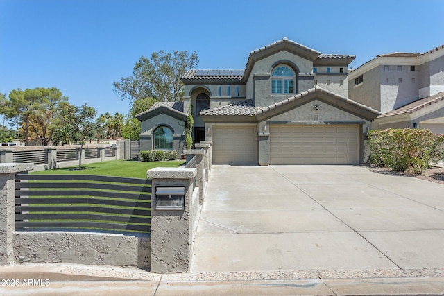 3202 E Orange Dr, Phoenix, AZ 85018 - view of front of property featuring solar panels, concrete driveway, stucco siding, a tiled roof, and an attached garage