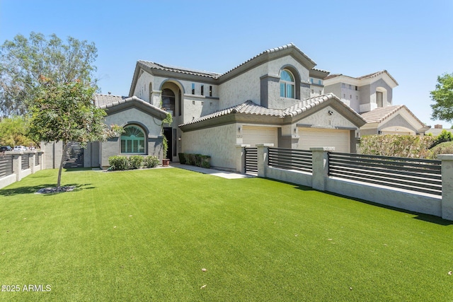 3202 E Orange Dr, Phoenix, AZ 85018 - mediterranean / spanish-style house featuring stucco siding, a tiled roof, and driveway
