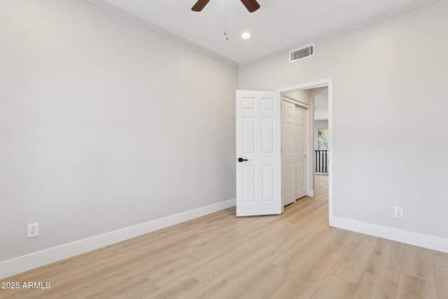 3202 E Orange Dr, Phoenix, AZ 85018 - empty room featuring baseboards, ceiling fan, ornamental molding, light wood finished floors, and recessed lighting