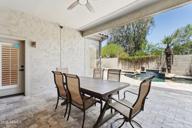 3202 E Orange Dr, Phoenix, AZ 85018 - fenced backyard with an in-ground hot tub, a ceiling fan, a patio, and outdoor dining space