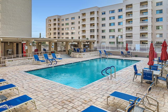 view of pool featuring a patio