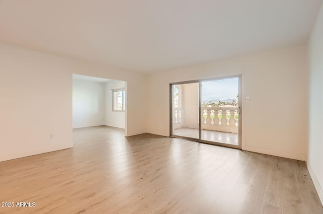 empty room featuring light hardwood / wood-style floors