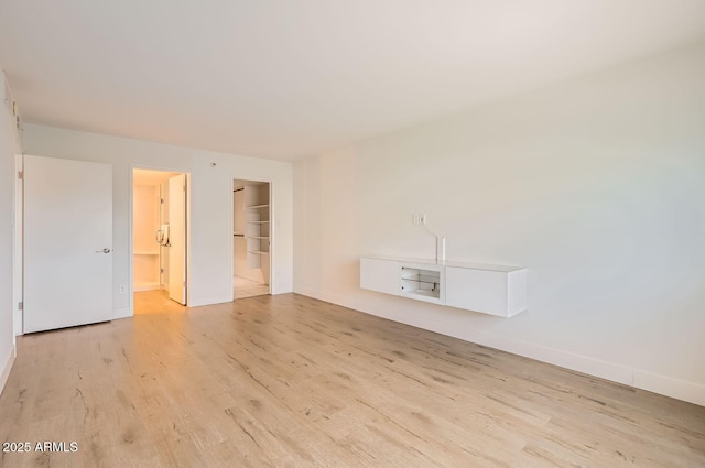 unfurnished room featuring light hardwood / wood-style flooring