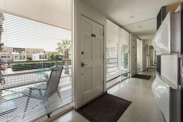 doorway with speckle patterned floor