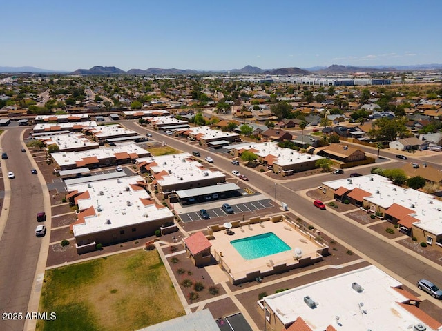 aerial view of mountains and a pool area