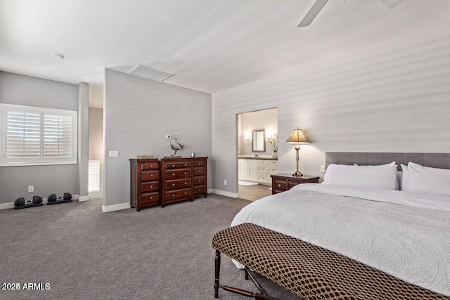 bedroom featuring carpet, ensuite bath, and ceiling fan