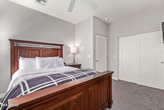 carpeted bedroom featuring a closet and ceiling fan