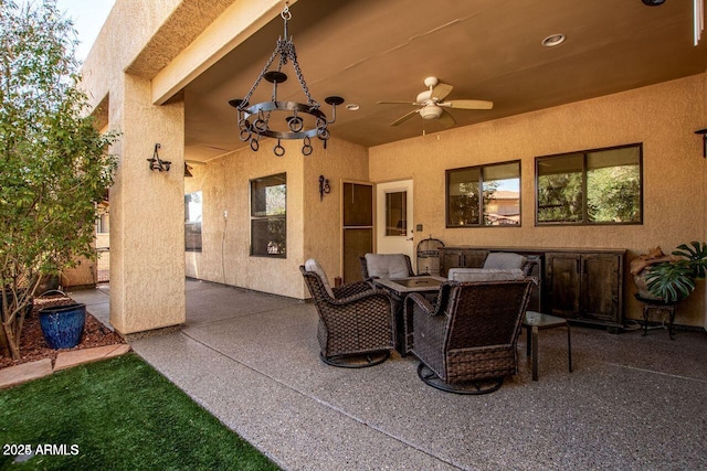 view of patio with ceiling fan