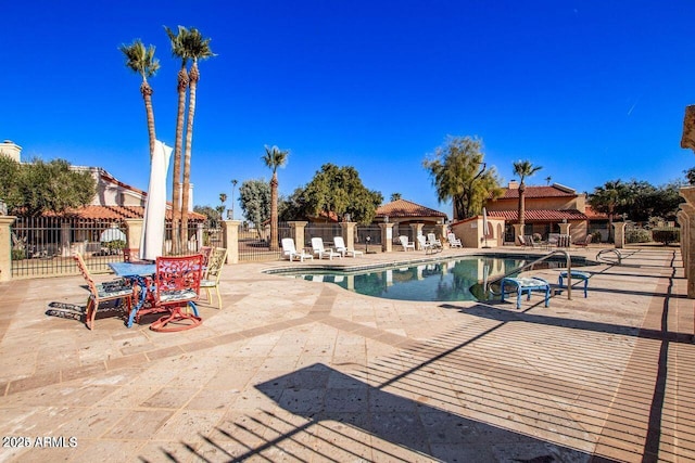 view of pool featuring a patio area