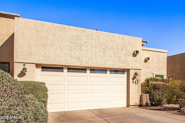 exterior space with a garage