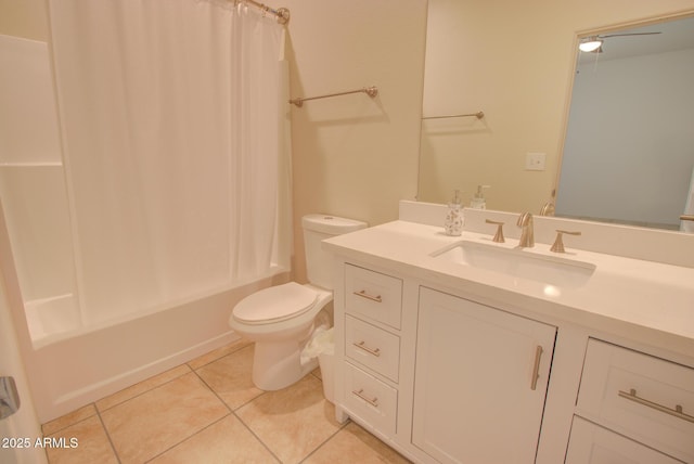 full bathroom with toilet, shower / bath combo, vanity, and tile patterned floors