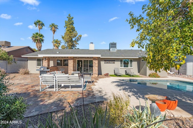 back of house with an outdoor hangout area, a patio, and central AC unit