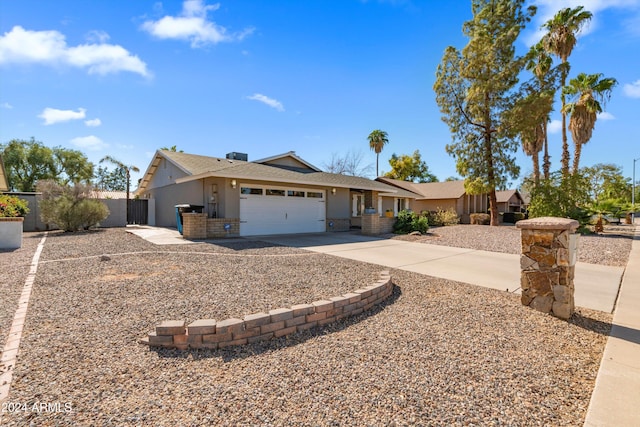 ranch-style home with a garage