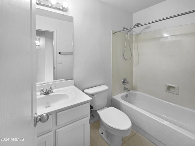 full bathroom featuring tile patterned floors, vanity, toilet, and tub / shower combination