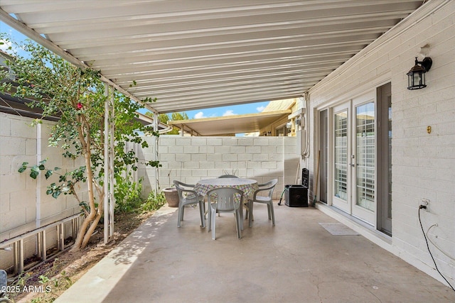 614 N Pioneer Cir, Mesa, AZ 85203 - view of patio featuring outdoor dining space and french doors