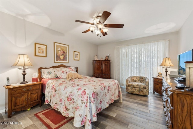614 N Pioneer Cir, Mesa, AZ 85203 - bedroom with wood finished floors and ceiling fan