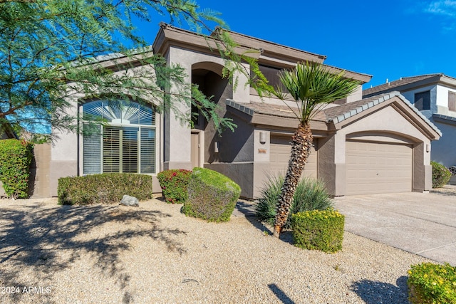 view of front of home with a garage