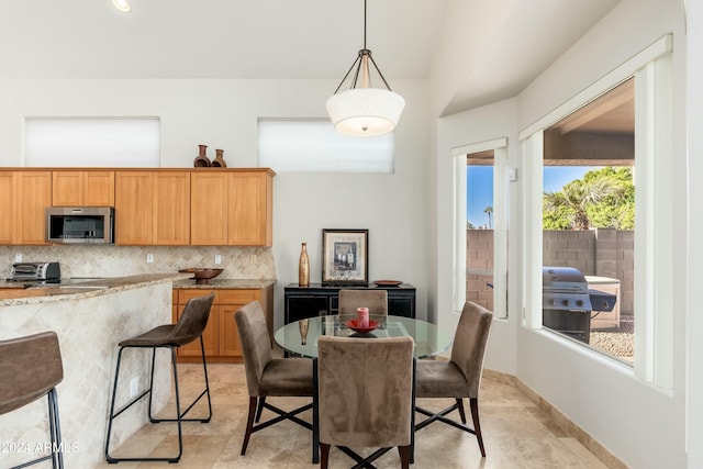 dining room with light tile patterned floors