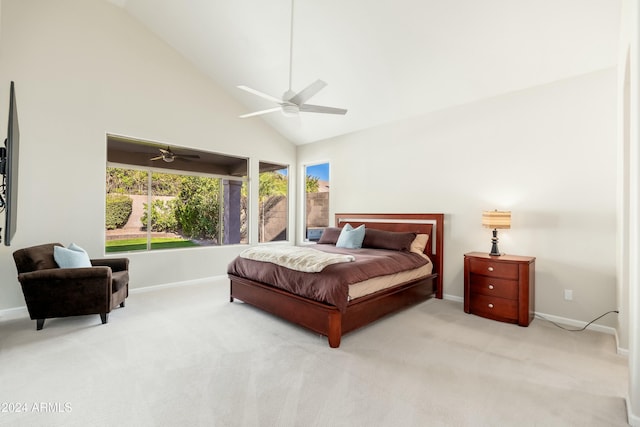 bedroom featuring ceiling fan, high vaulted ceiling, and light carpet