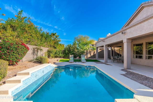 view of pool featuring a patio