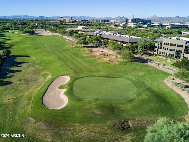 birds eye view of property featuring a mountain view