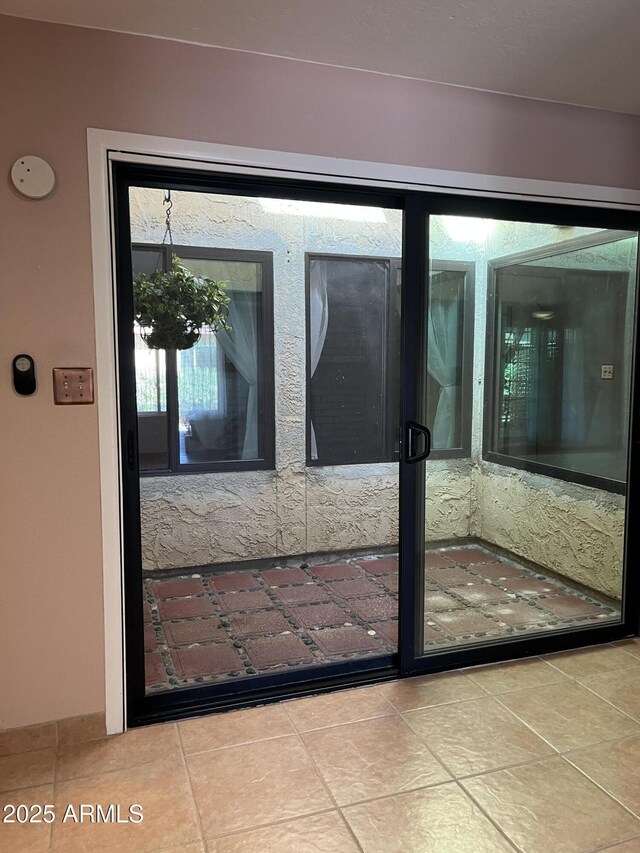 4916 E Hopi St, Phoenix, AZ 85044 - doorway to outside featuring tile patterned flooring