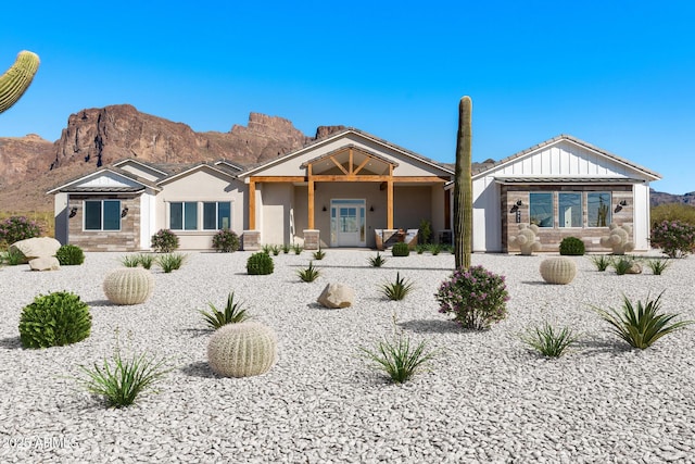 view of front of home with a mountain view