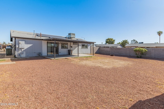 back of house featuring a patio and central AC unit