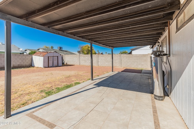 view of patio / terrace with a storage unit