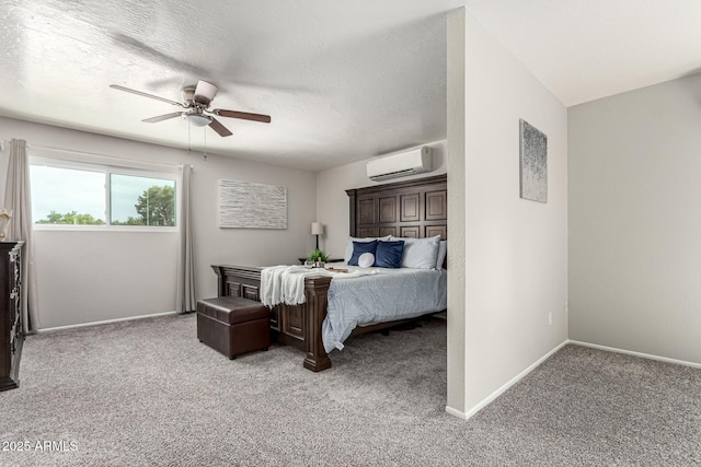 3358 W Sandra Ter, Phoenix, AZ 85053 - bedroom featuring a wall unit AC, light carpet, baseboards, and a textured ceiling