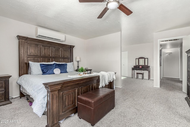 3358 W Sandra Ter, Phoenix, AZ 85053 - bedroom with an AC wall unit, light colored carpet, and ceiling fan