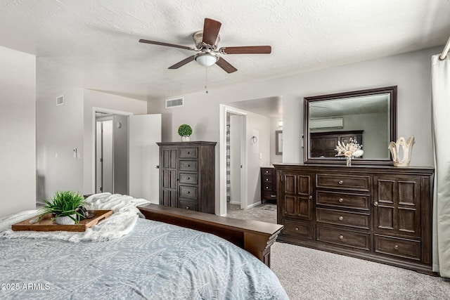 3358 W Sandra Ter, Phoenix, AZ 85053 - carpeted bedroom featuring a wall unit AC and ceiling fan