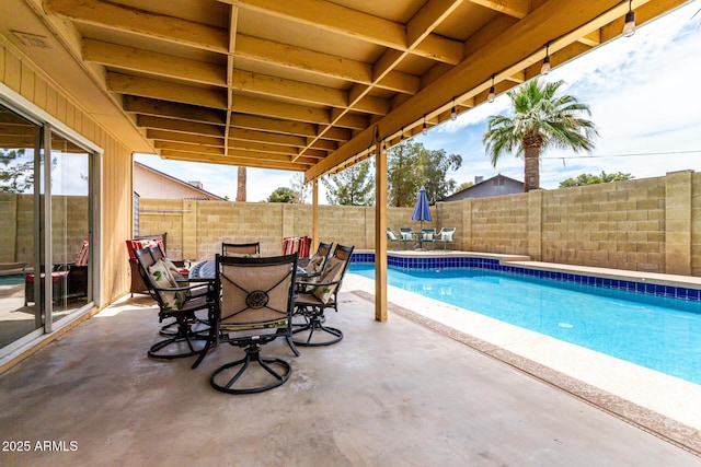 3358 W Sandra Ter, Phoenix, AZ 85053 - view of swimming pool with a patio, outdoor dining space, and a fenced backyard