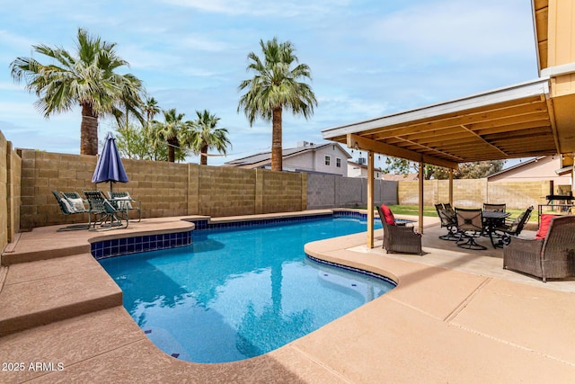 3358 W Sandra Ter, Phoenix, AZ 85053 - view of swimming pool featuring outdoor dining area, a fenced backyard, and a patio