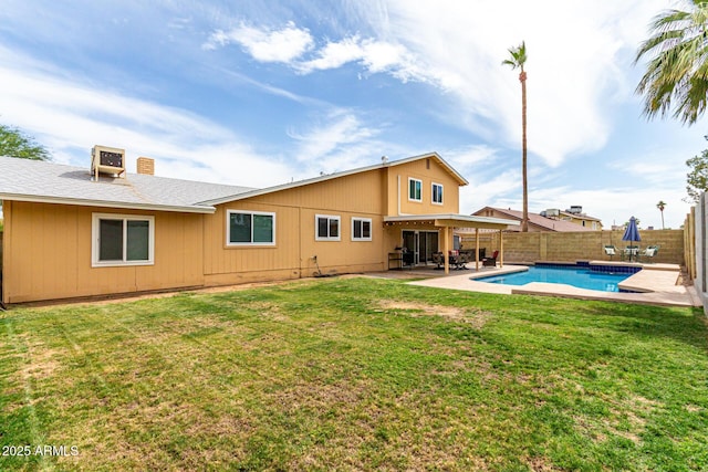 3358 W Sandra Ter, Phoenix, AZ 85053 - back of house with a patio and a chimney