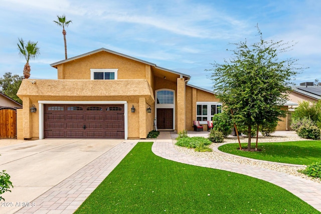3358 W Sandra Ter, Phoenix, AZ 85053 - view of front of property with stucco siding, driveway, and a gate