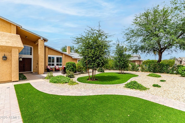 3358 W Sandra Ter, Phoenix, AZ 85053 - view of grassy yard with a patio area