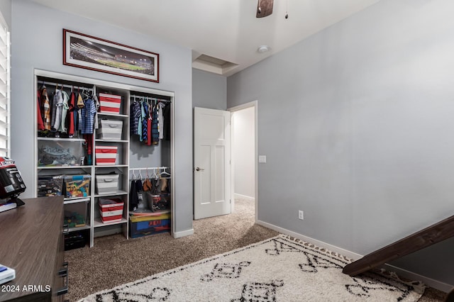 bedroom with carpet, a closet, and baseboards