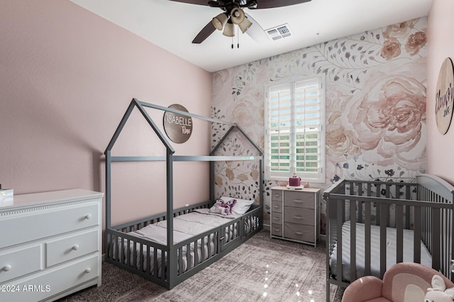 bedroom featuring visible vents and a ceiling fan