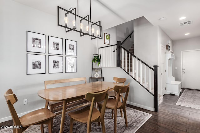 dining space featuring recessed lighting, visible vents, stairway, wood finished floors, and baseboards