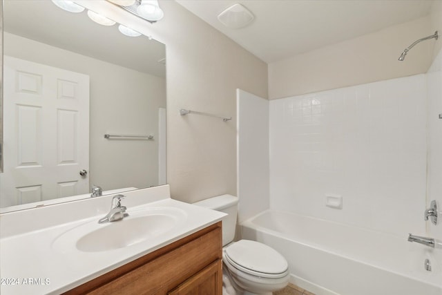 bathroom featuring shower / bathtub combination, toilet, and vanity