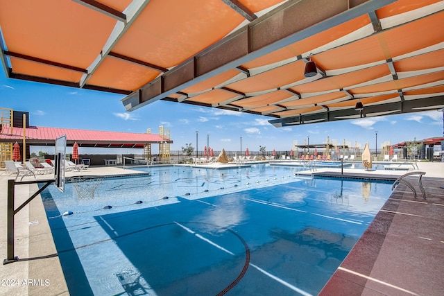 view of pool featuring a patio area