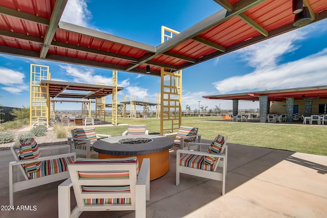 view of patio / terrace featuring a fire pit